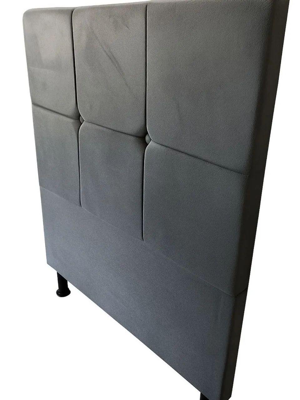 Beautiful upholstered pink bed headboard with modern and elegant design.