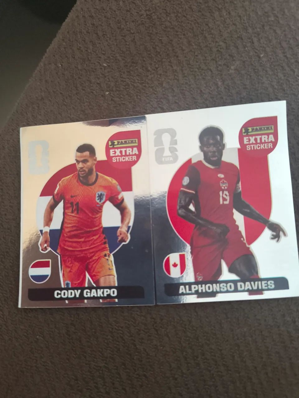 Figurinha Bronze - Alphonso Davies e Cody Gakpo