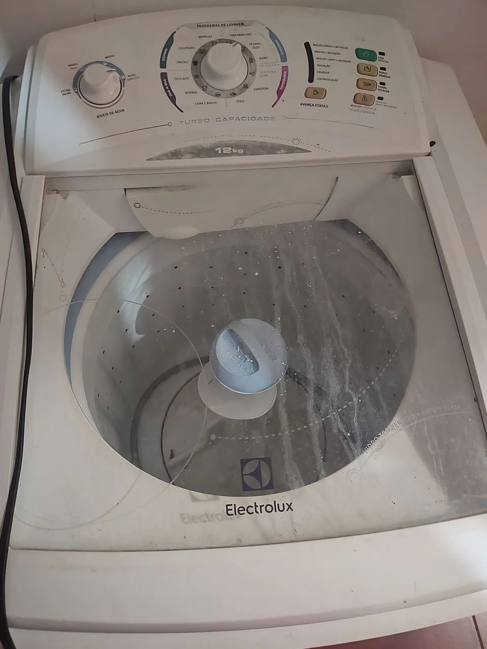 Máquina de lavar com defeito 