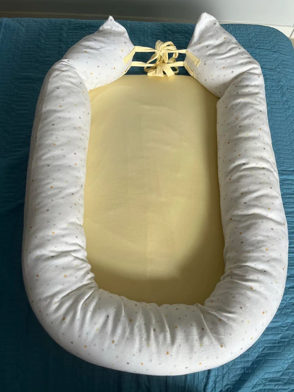 NINHO REDUTOR DE BERÇO HUG