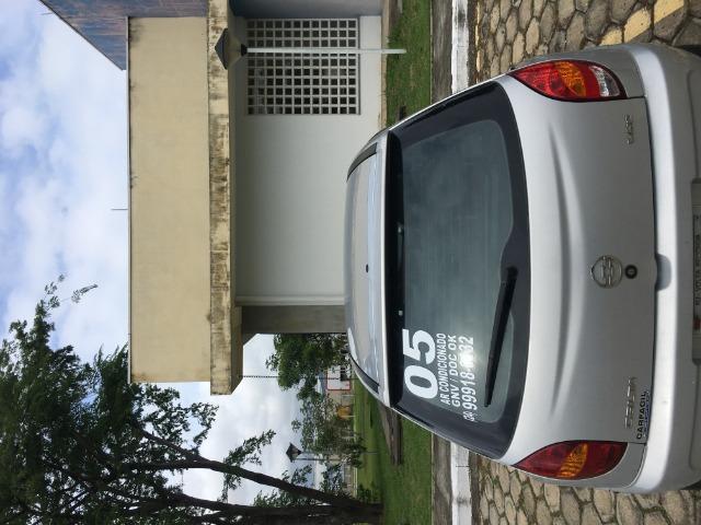 Celta 1.0 spirit 4p com 145000 km com ar , gnv e doc ok! - Foto 6
