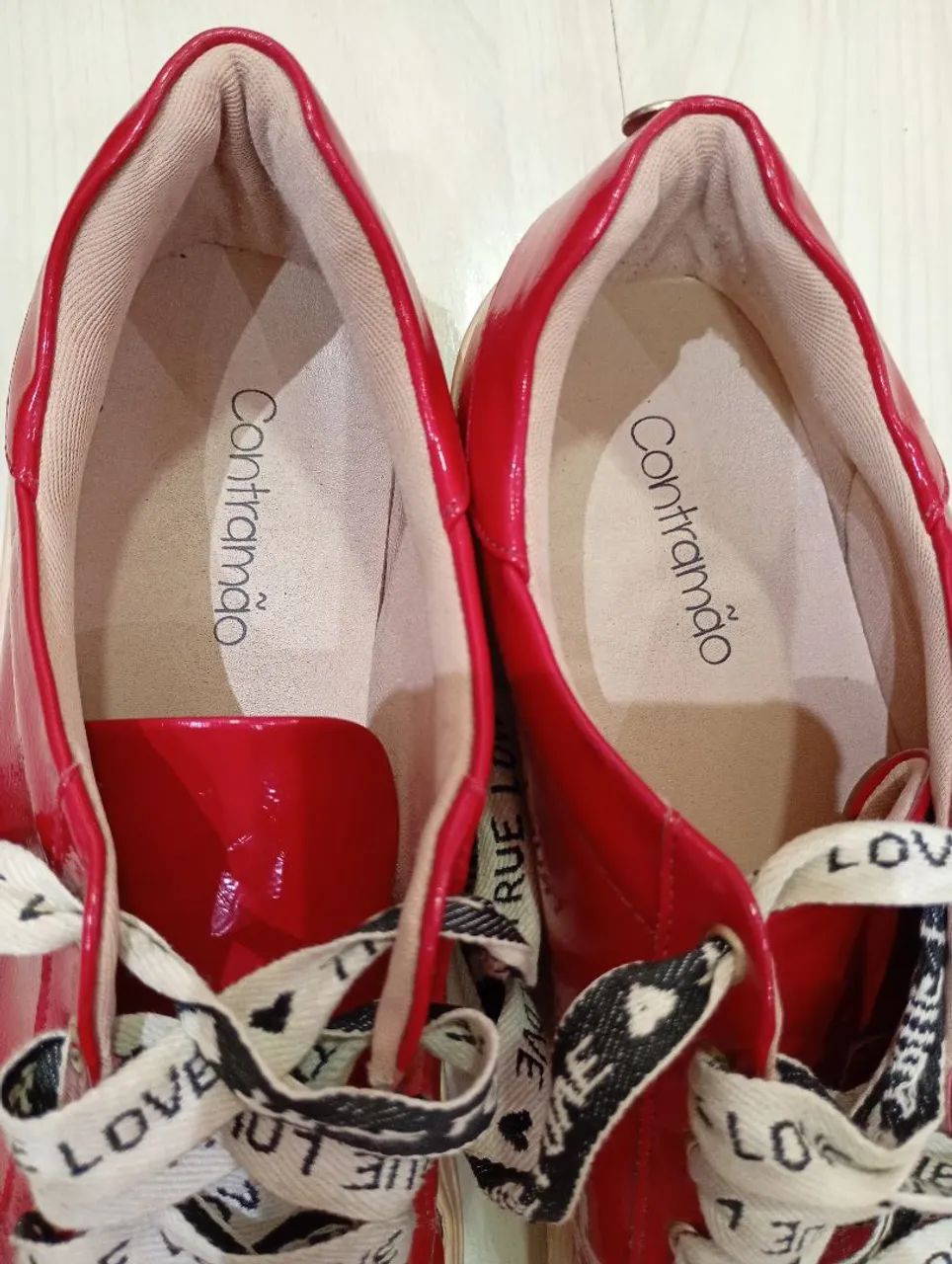 Tênis vermelho contramão  - Foto 4