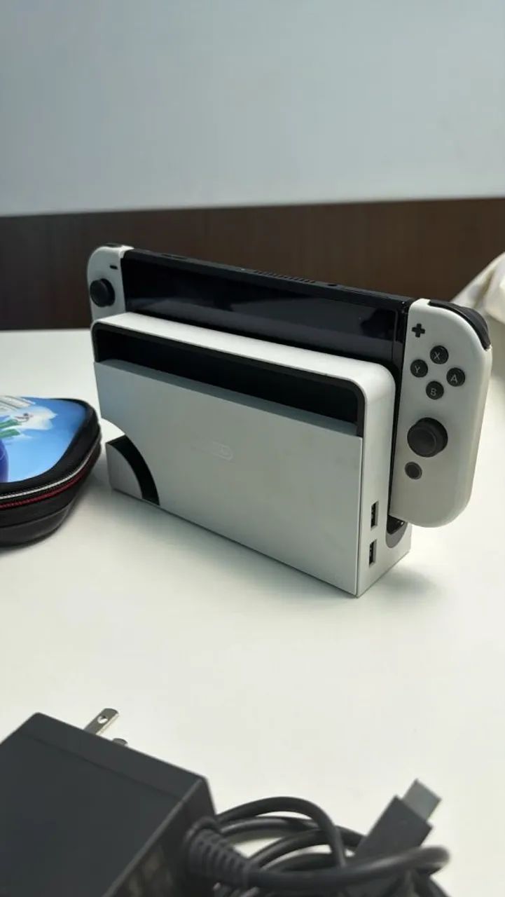 Nintendo Switch Oled com 4 jogos - Foto 4