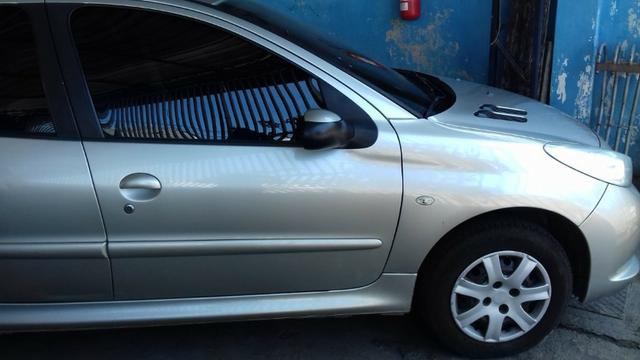 Peugeot 207 prata 1.4 completo único dono - Foto 2