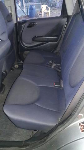 Vendo ou troco Honda fit 2004 quitado $6.500 leia o anúncio