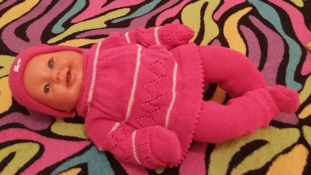 Boneca bebê com roupas cor de rosa - Foto 3