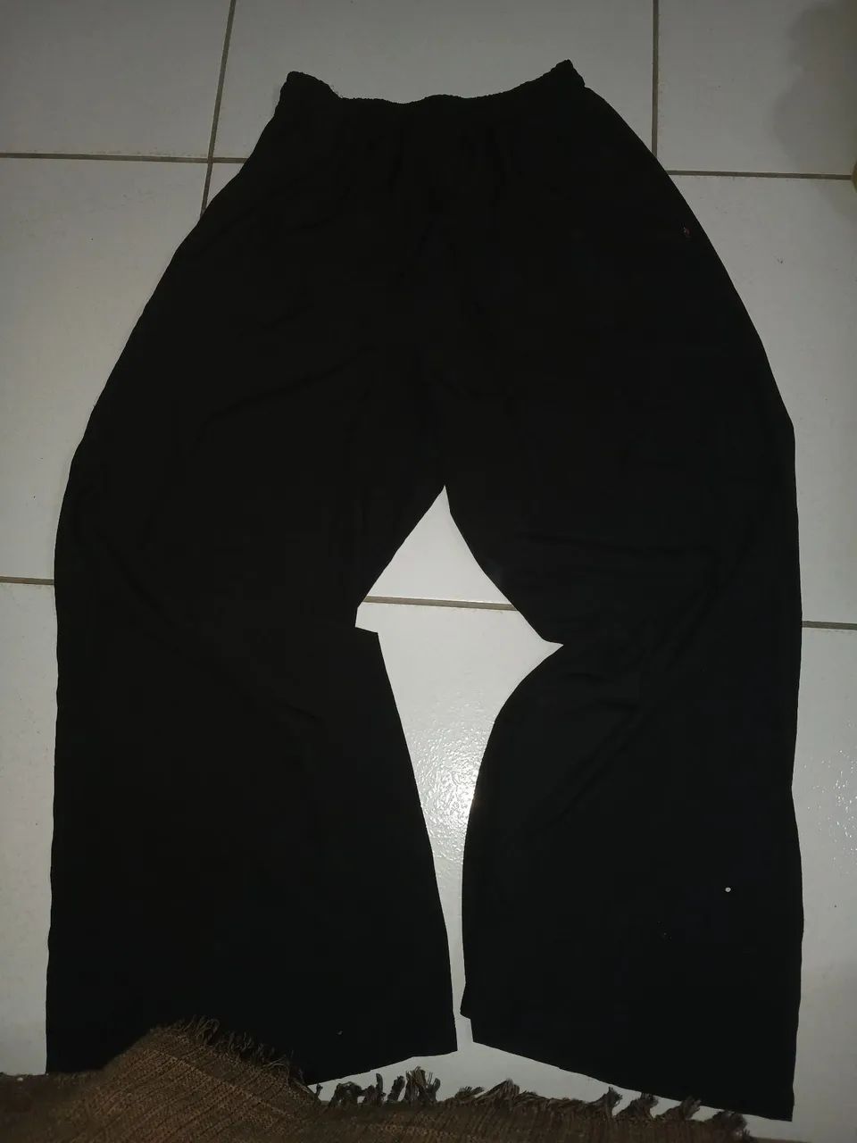 Calça feminina preta de Tactel