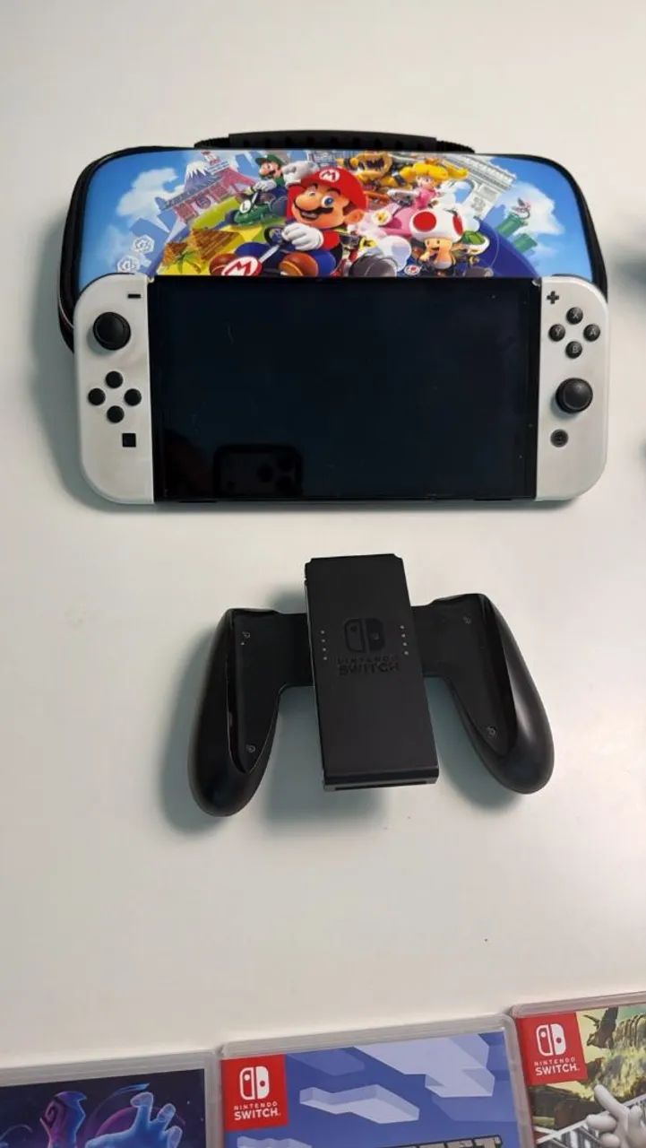 Nintendo Switch Oled com 4 jogos - Foto 3