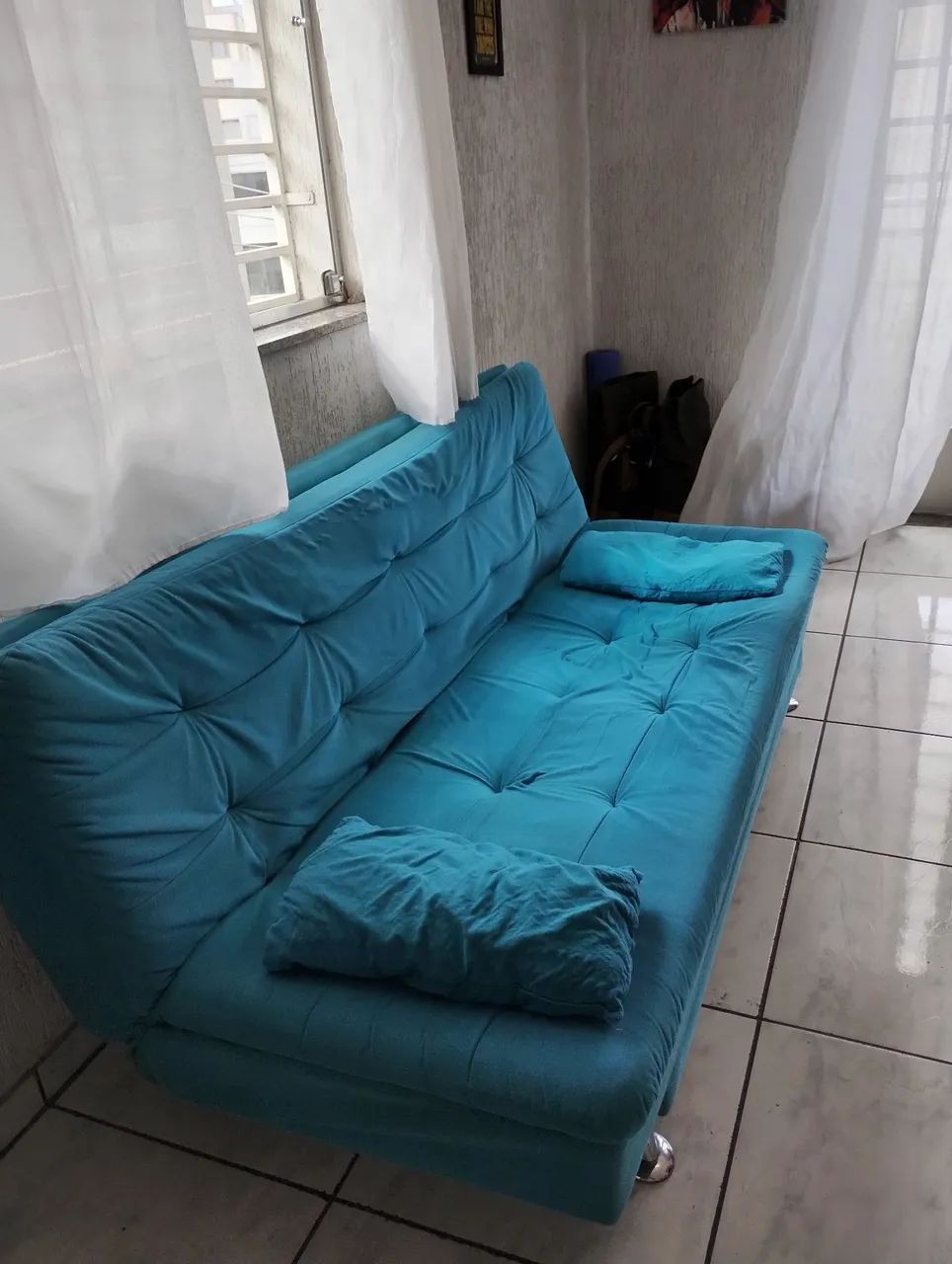 Sofá cama azul turqueza em Suede