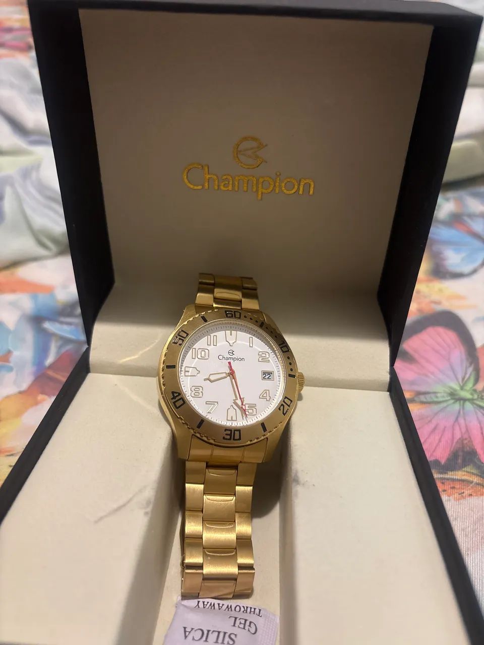 Relógio champion dourado