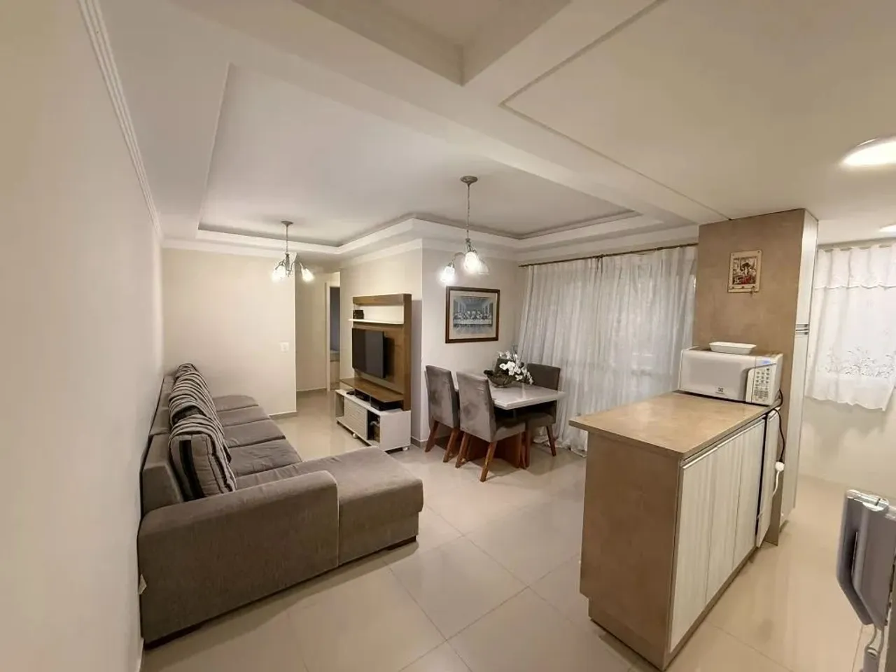 Apartamento com 3 dormitórios à venda, 66 m² por R$ 430.000,00 - Uberaba - Curitiba/PR