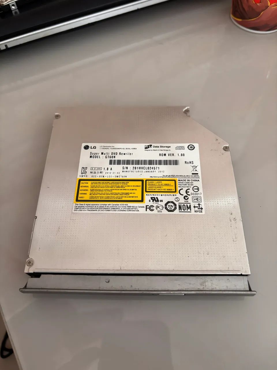 Leitor de CD e DVD para notebook positivo