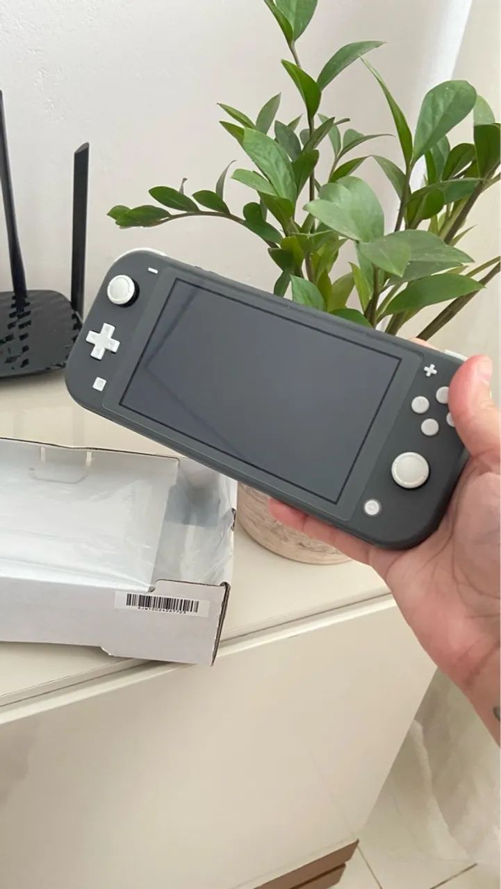 Nintendo Switch Lite - 2 jogos, capa e cartão micro sd 128gb - Foto 4