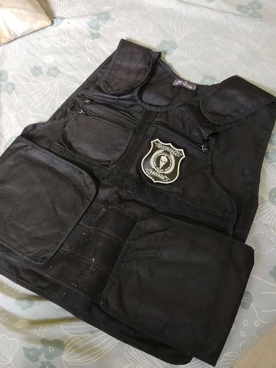 Colete de segurança privada