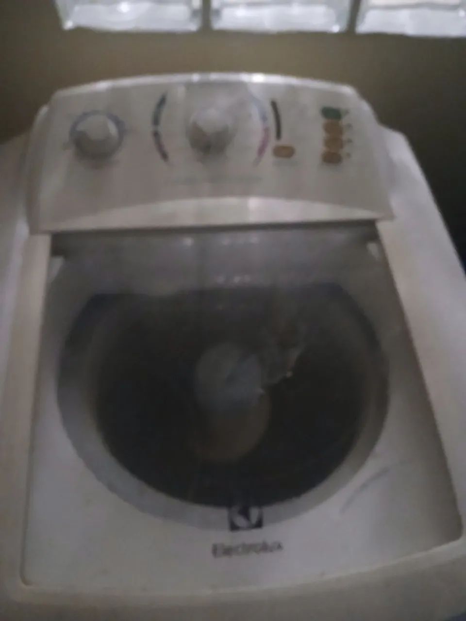Máquina de lavar com defeito