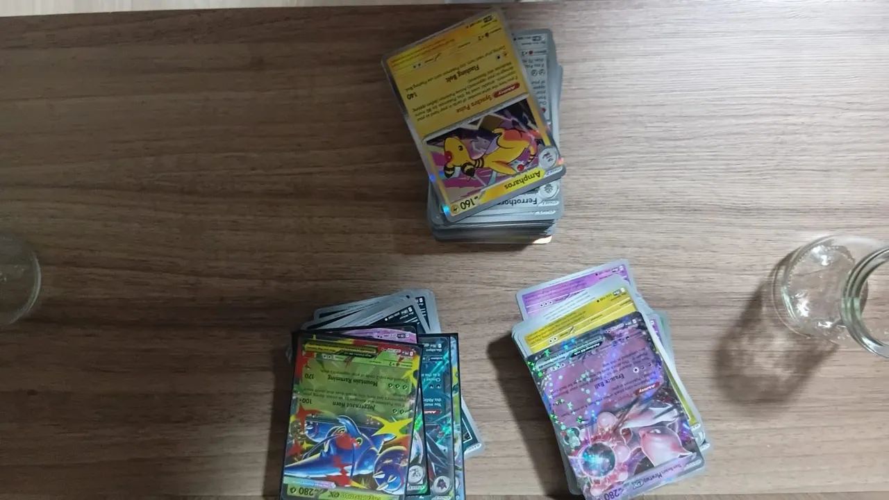 Pacote com 1100 cartas pokémon - Foto 2