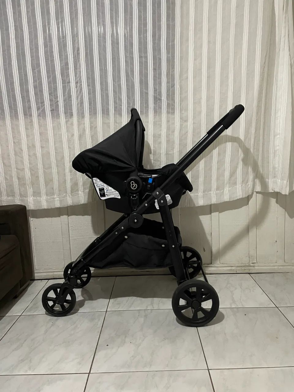 Kit carrinho + bebê conforto e base  - Foto 5