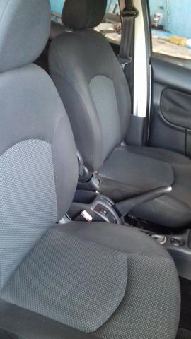 Peugeot 207 prata 1.4 completo único dono - Foto 4
