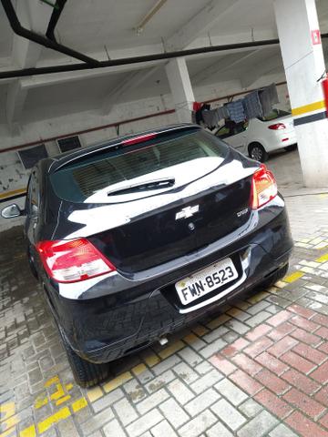Onix 2016 completo carro impecável ! - Foto 6