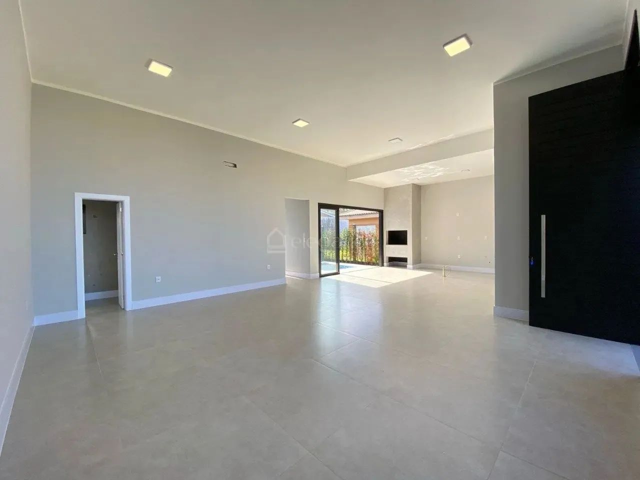 Casa próximo ao mar com quatro suítes à venda no centro de Xangri-Lá. - Foto 4