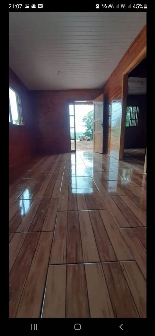 Casa de madeira com acabamento impecável