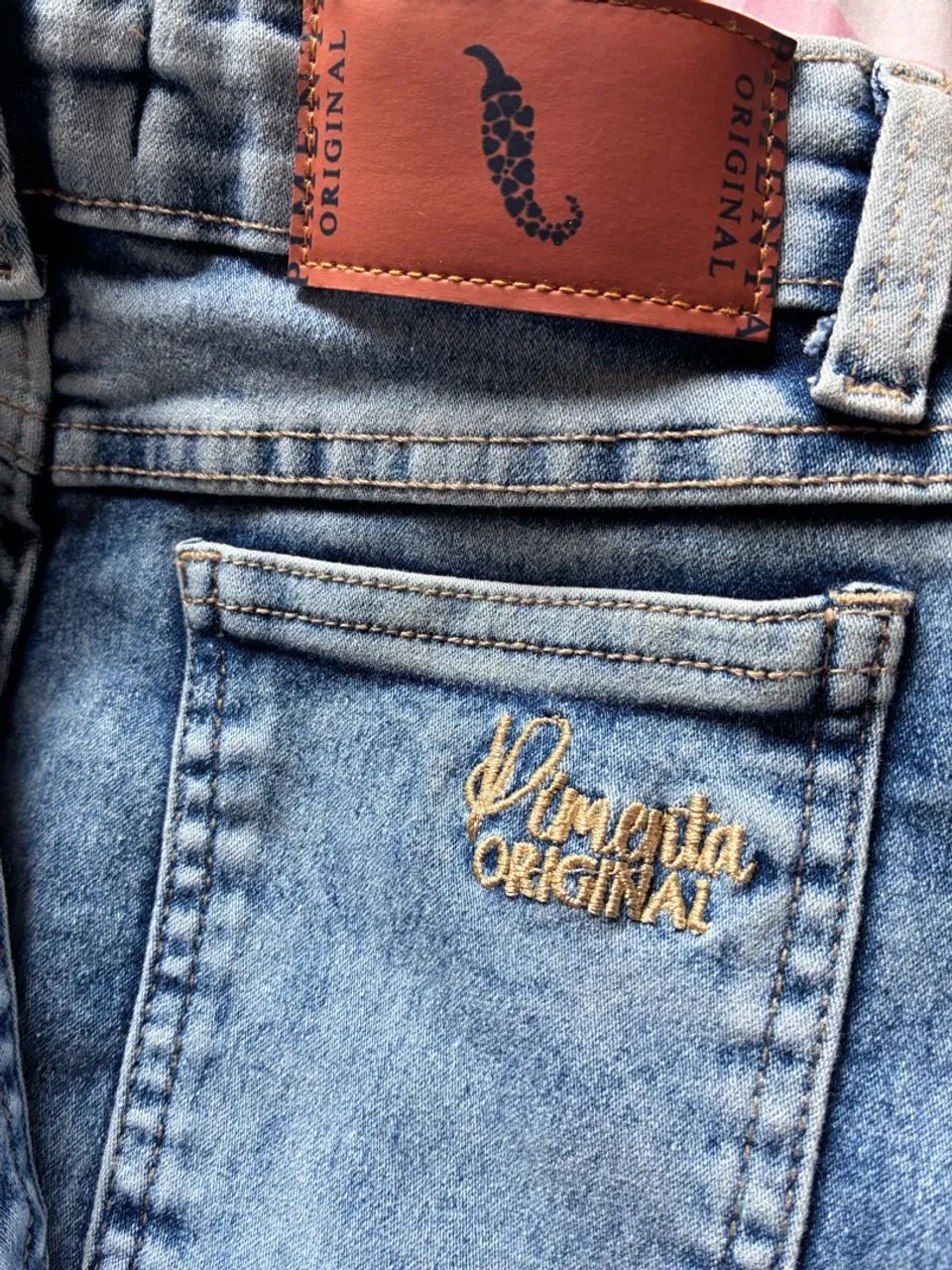 Calca jeans marmorizada pimenta original  - Foto 3