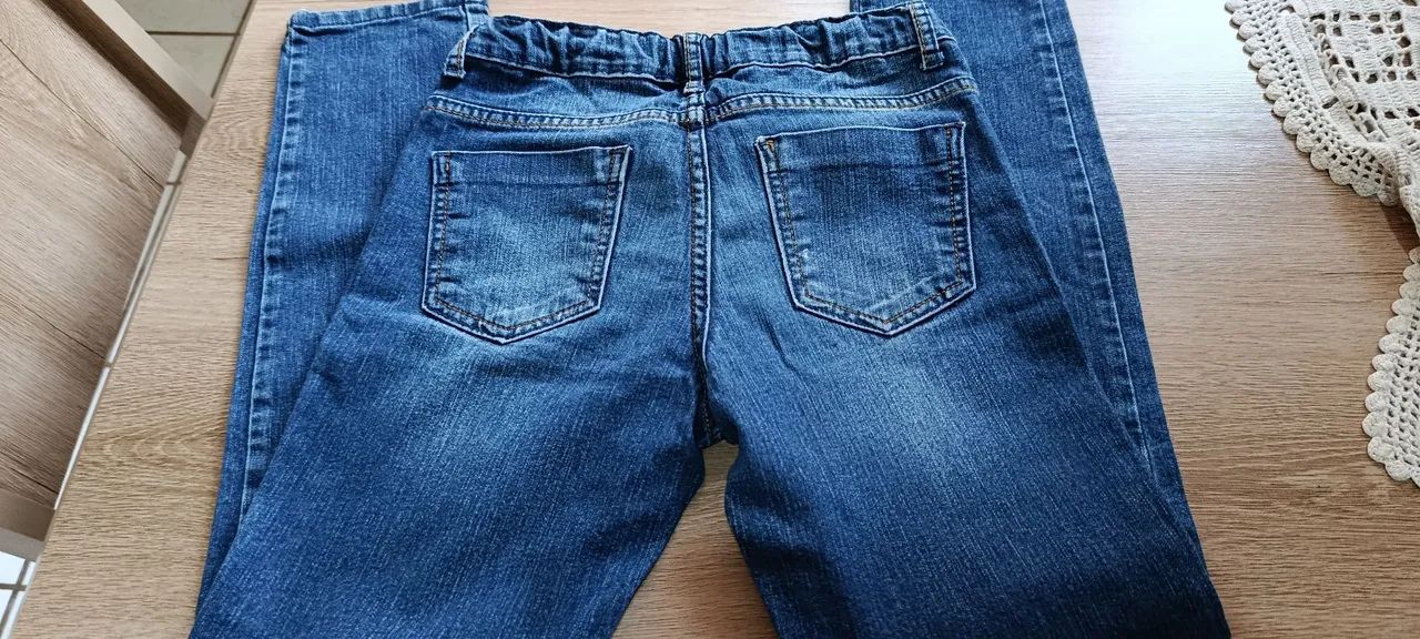 Calça jeans infantil conservada n.10 anos - Foto 2
