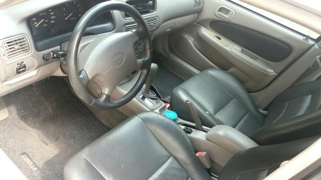 Corolla 1.8 automático 106.000 km ano 2000 - Foto 5