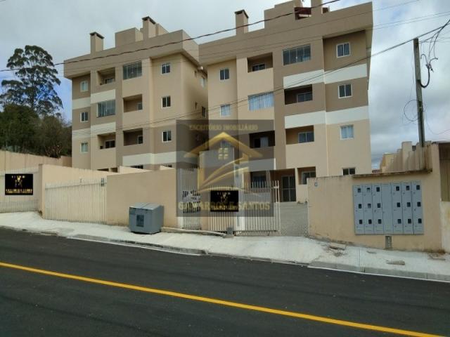 Aluga-se apto com sacada e churrasqueira no centro de quatro barras