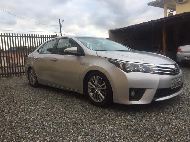 Corolla xei 2015 legalizado baixo 66.000 A Baixo dá fipe