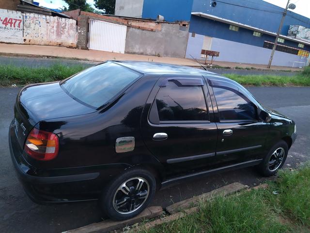 Vendo siena 2004 /04 valor 11.000.00 completo menos direçao tel * - Foto 4