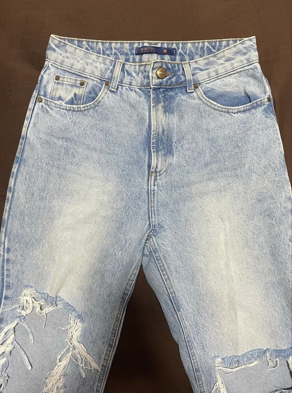 Calça reta jeans liso com puídos renner