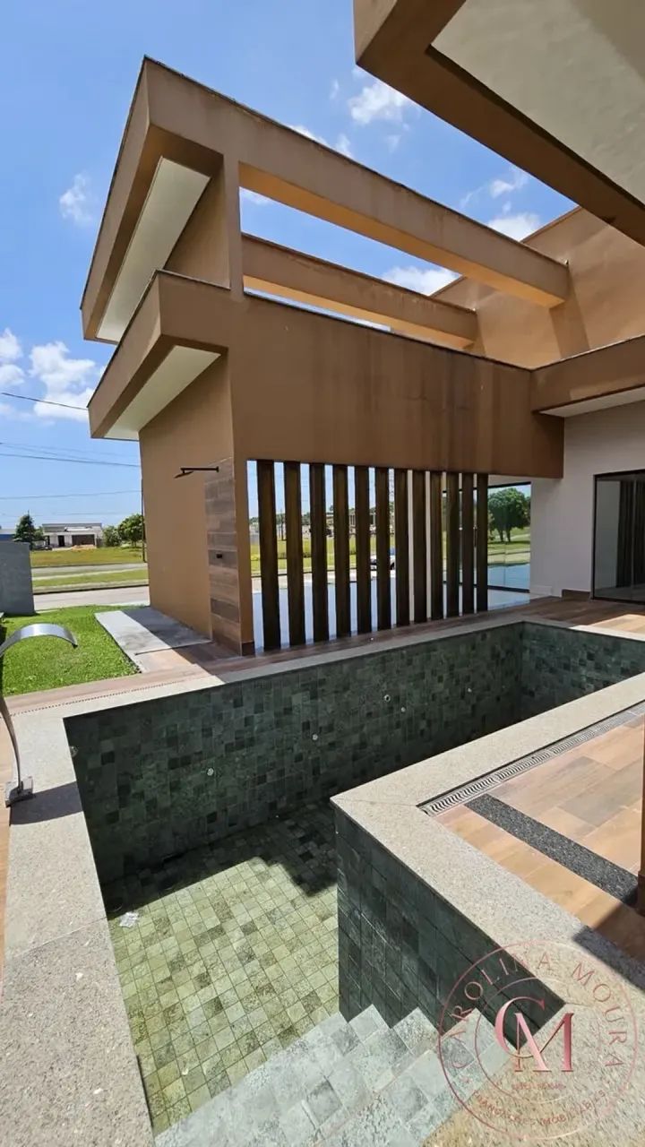 Condomínio Alphaville  Casa com 3 suítes, piscina, mobiliada. - Foto 2