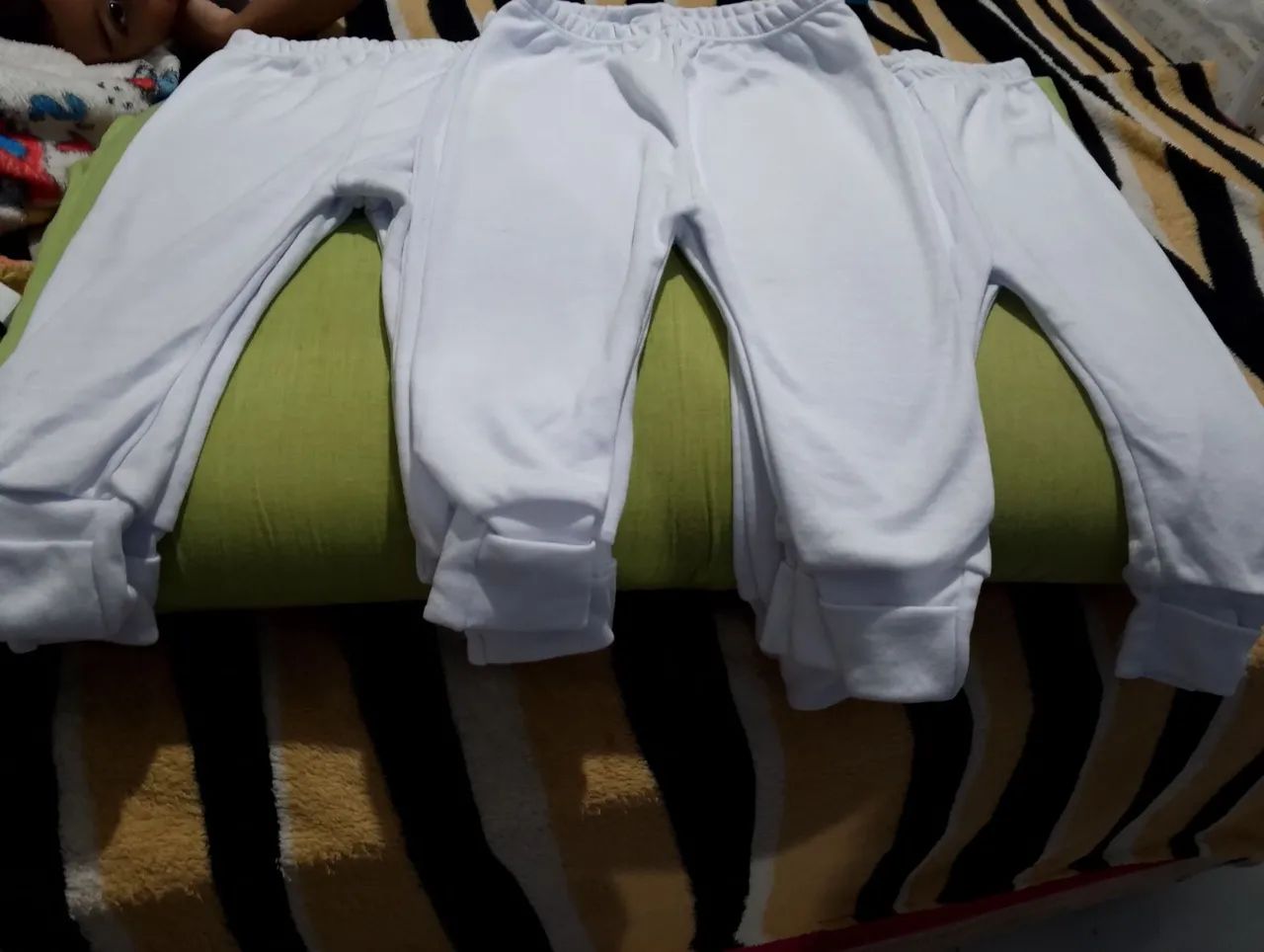Mijao calça pra bebê, GG. São 7 no total.
