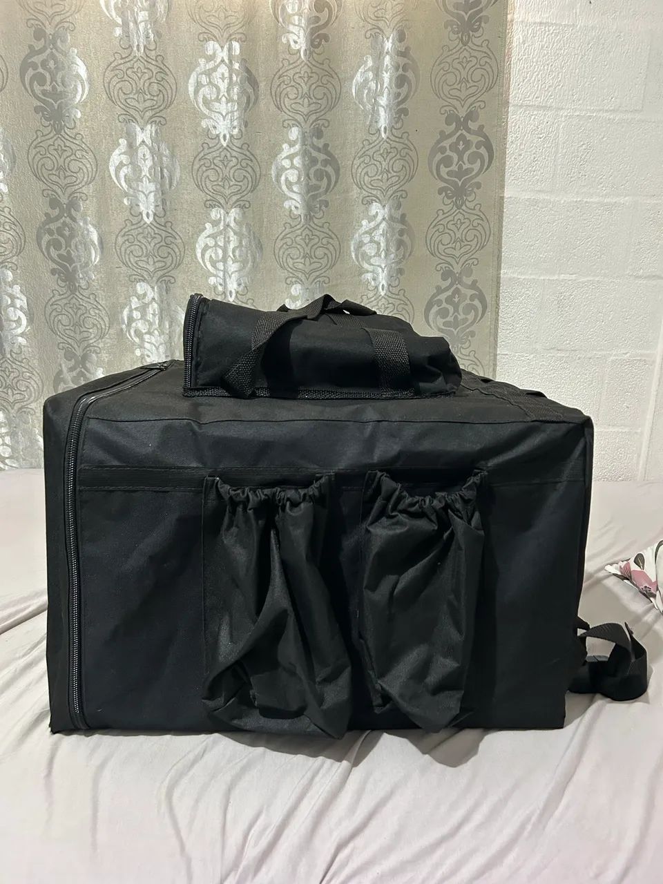 Vendo bag de 55 litros 250 reais, cabe pizza família