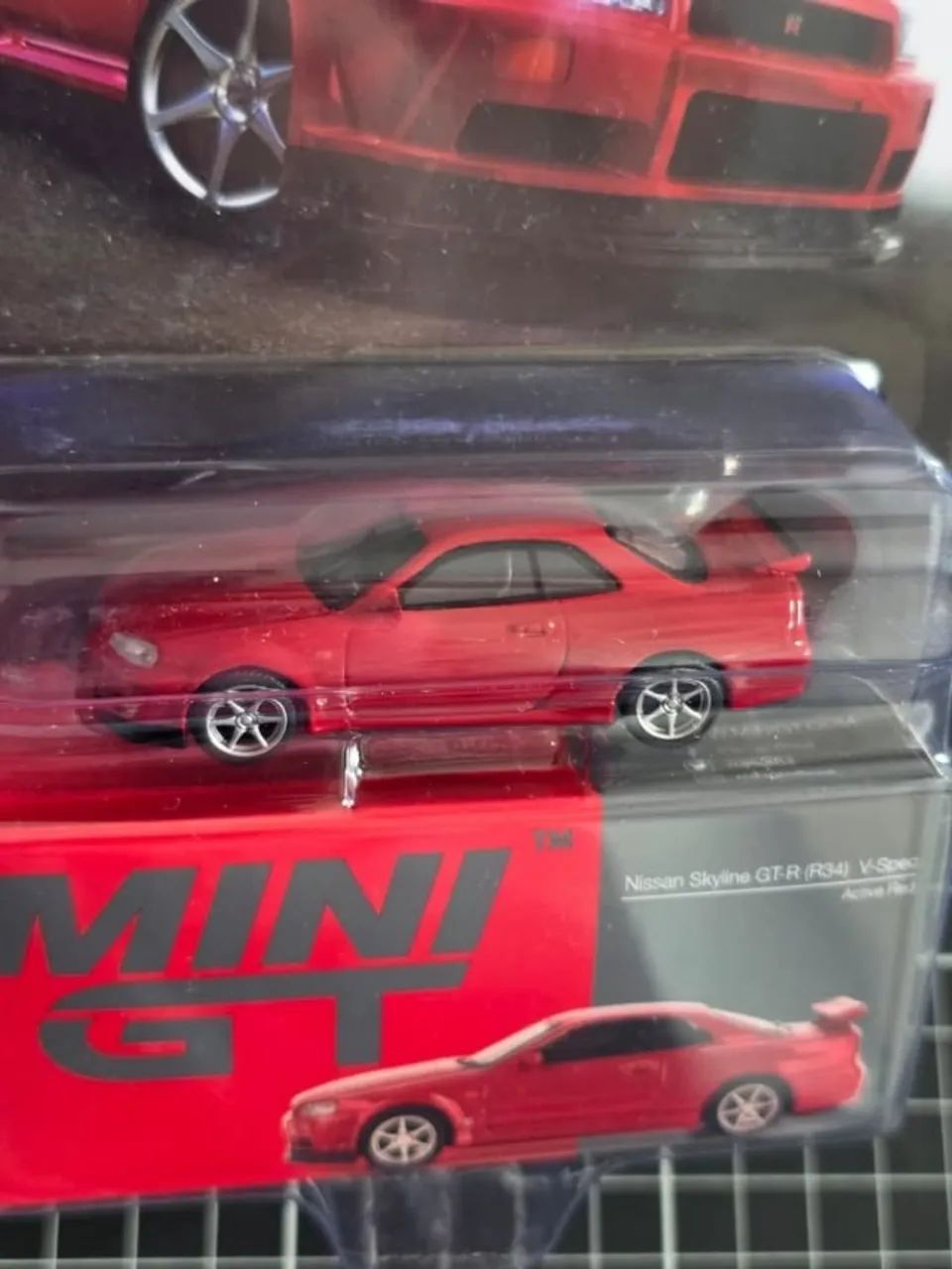 Nissan Skyline GT-R R34 V-Spec Vermelho - MiniGT - Hobbies e