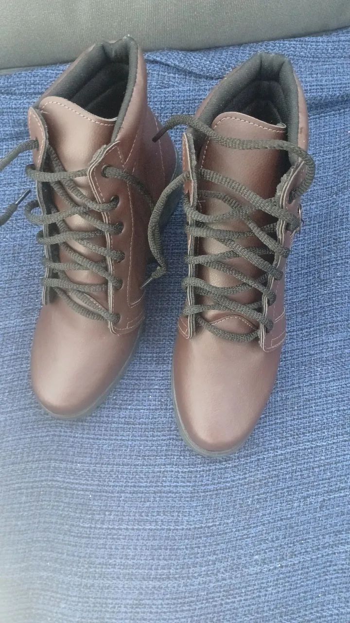 Bota Nova na caixa 