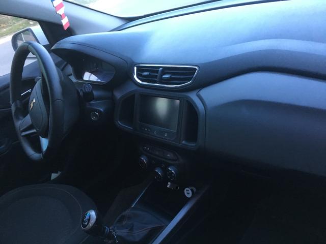 Vendo Onix LT 1.0 completo com Multimidia - Foto 3