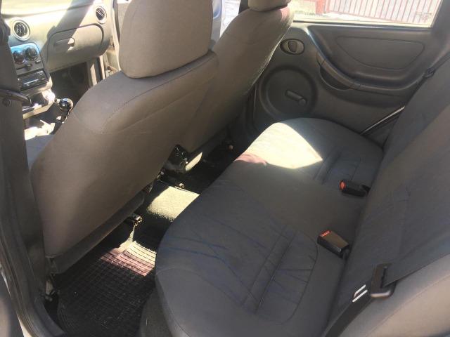 Celta 1.0 spirit 4p com 145000 km com ar , gnv e doc ok! - Foto 7