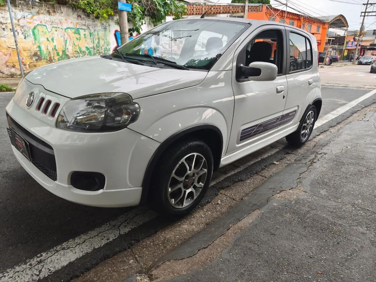 Fiat Uno Sporting 1.4 EVO Fire Flex 8V 4P 2014 - Foto 2