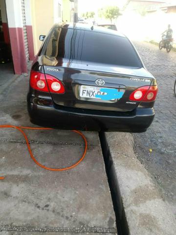 Vendo ou troco corolla pra assumir as promissoroas - Foto 2