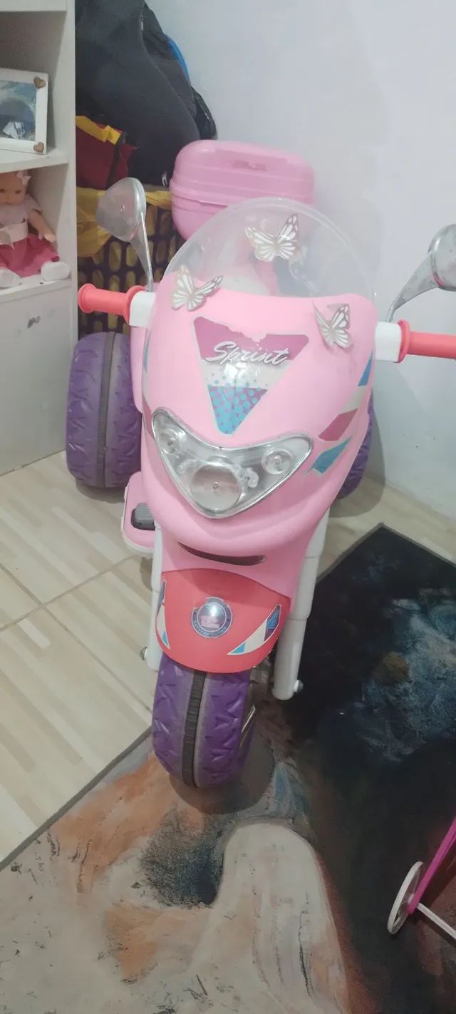 Moto eletrica infantil sprint turbo pink com bau E capacete no
