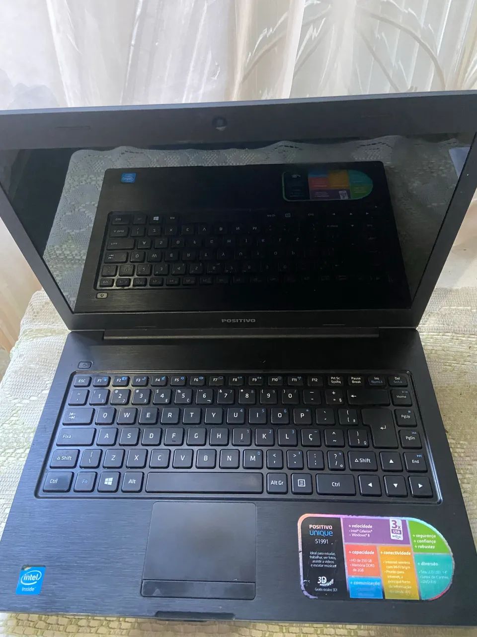 Vendo notebook Positivo melhorado, em muito bom estado