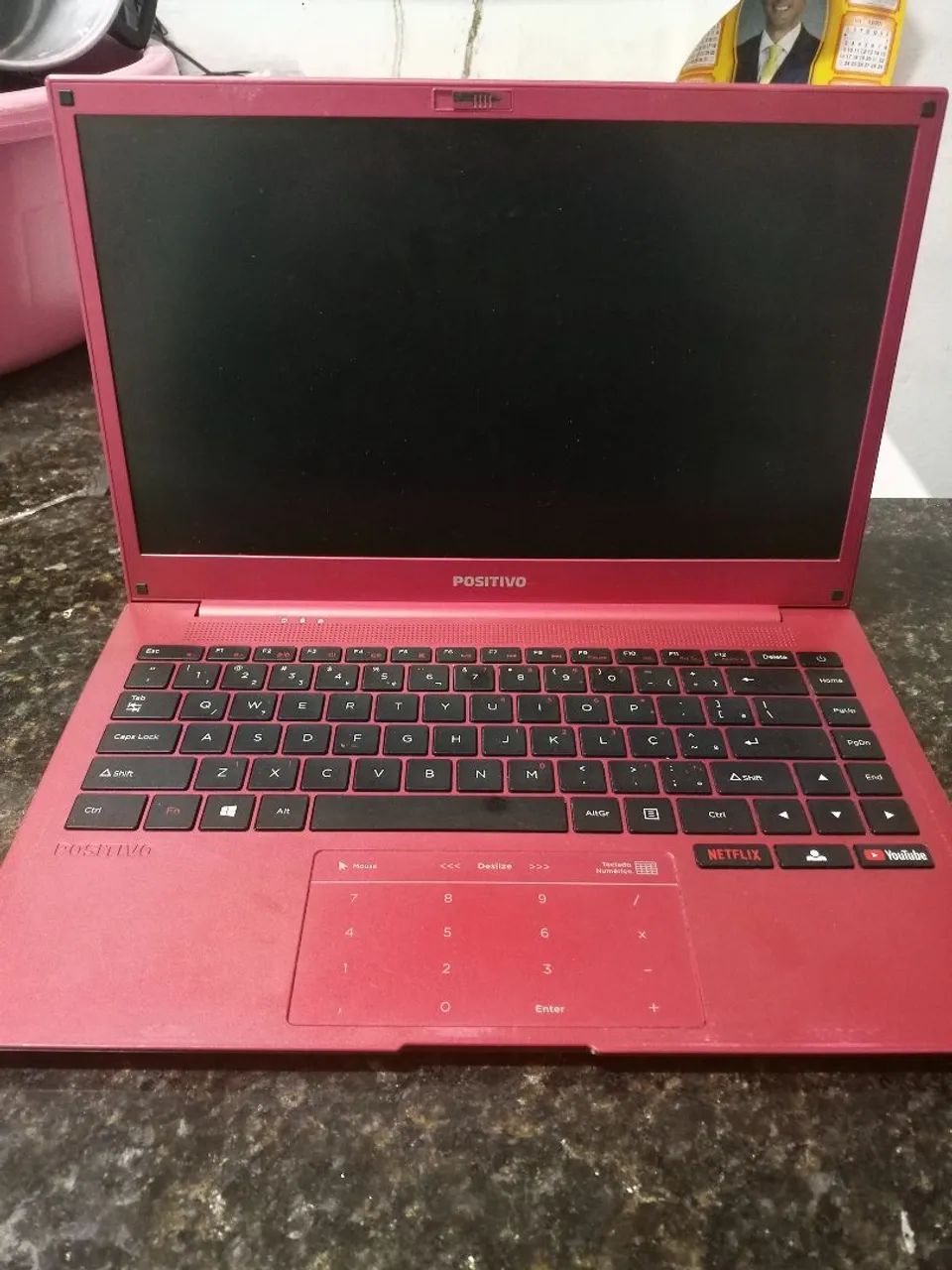 Notebook positivo vermelho