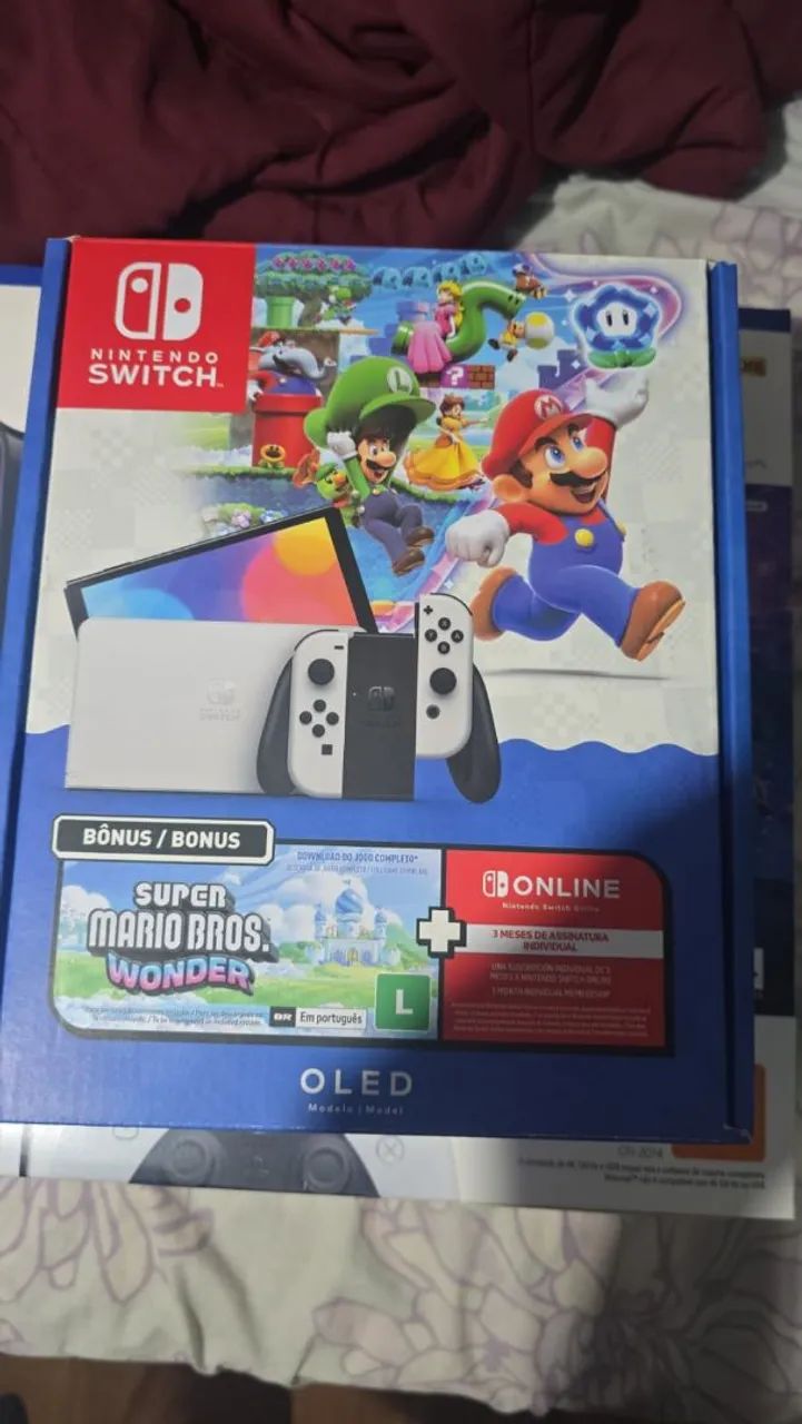 Vendo nintendo switch oled bloqueado com 2 anos de garantia 