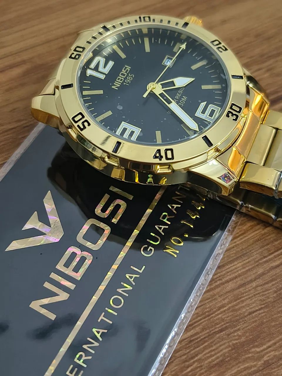 Relógio masculino Nibosi dourado - Foto 3