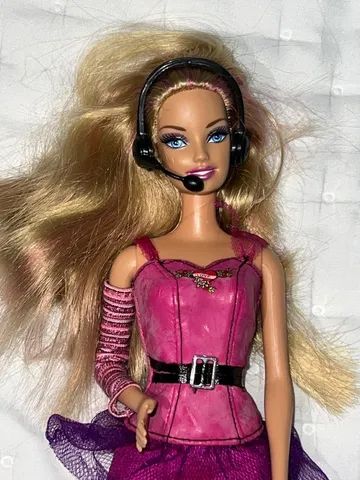 boneca barbie roqueira
