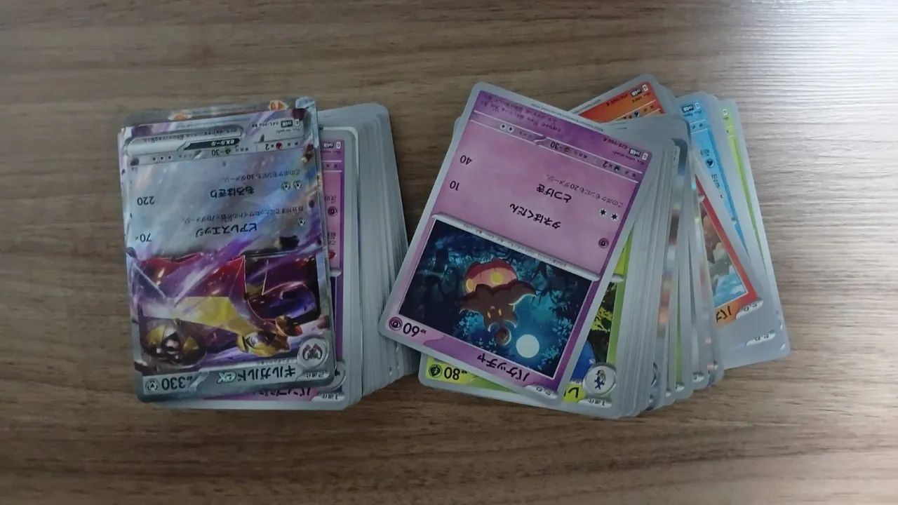 Pacote com 1100 cartas pokémon - Foto 3