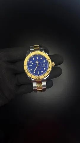 Relógio rolex Prata com fundo Azul