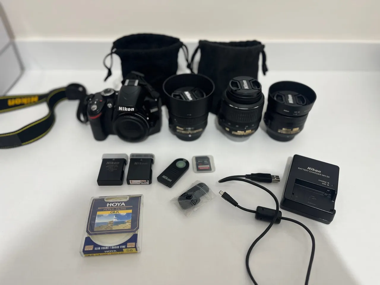 Câmera Nikkon 3200 com lentes 35 e 50mm